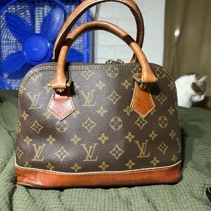 Louis Vuitton Alma Monogram Purse